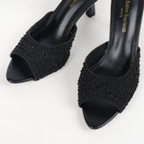 Lena mules à talon tressées