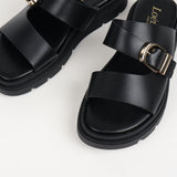 Mules Noémie à boucle et semelle crantée noires