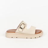 mules femme beige à double bride avec boucle dorée et semelle épaisse