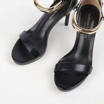 Sandales à talon noir soirée chic bijou dorée
