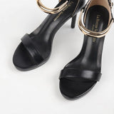 Sandales à talon noir soirée chic bijou dorée